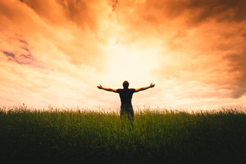 Silhouette of man and sunshine
